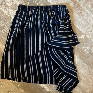 Truce Brand. Super cute skirt with side material extra flowy detail.